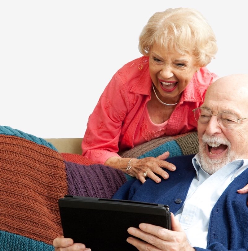 Grandma & Grandpa watching at a converted home video on thier ipad